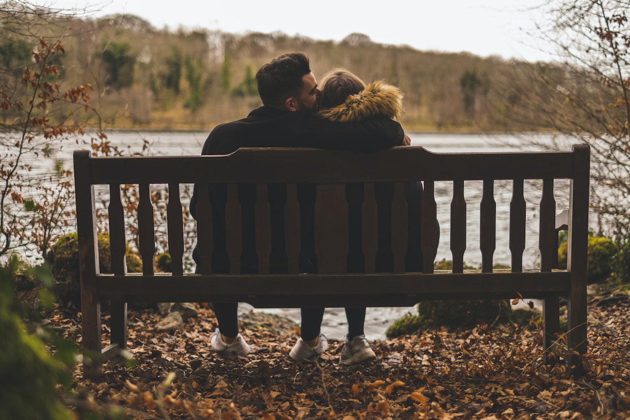 Couple in front of river